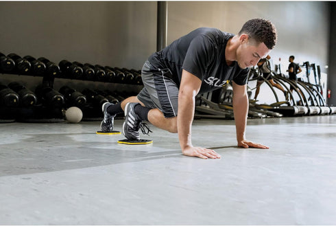 SKLZ Slidez Dual-Sided Exercise Glider Discs for Core Stability, Standard Use, Yellow