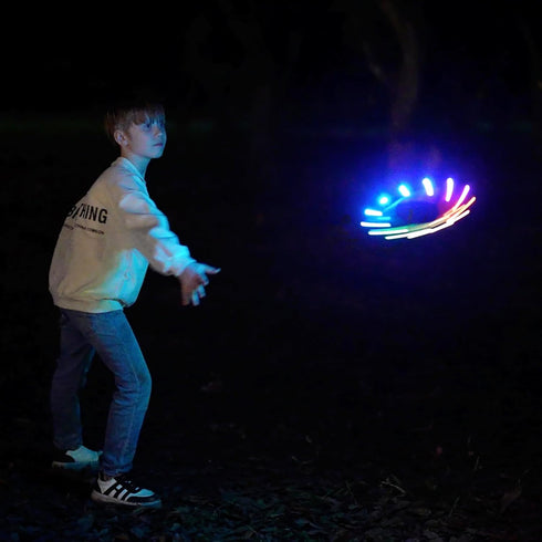 TOSY Flying Ring - 12 LEDs, Soft & Photoluminescent Rim, Auto Light Up, Safe & Waterproof Frisbee for Fun