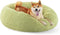 Bedsure Calming Dog Bed for Medium Dogs, Donut Washable Pet Bed, Anti-Slip Round Fluffy Faux Fur, Green, 30 inches.