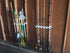 Storage Rack for Garage Doors with Hooks for Fishing Rods, Kayak Paddles, and More