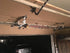 Storage Rack for Garage Doors with Hooks for Fishing Rods, Kayak Paddles, and More